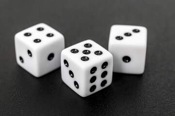 Dices on the black background. Close up. - 692690027