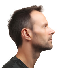 Obraz premium The side profile of a slender middle-aged man. He has a serious expression, and his head is slightly tilted upward.