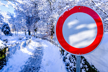 warning sign in german - path closed due to snowfall