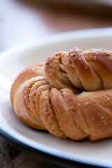 Macro shot of a traditional Swedish cardamom bun kardemummabullar