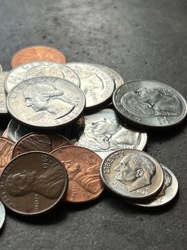 american money, coins, quarters, dimes, nickels, pennies, close up