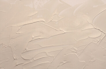 Art oil and acrylic smear blot canvas painting stucco wall. Abstract texture beige, nacre glitter...
