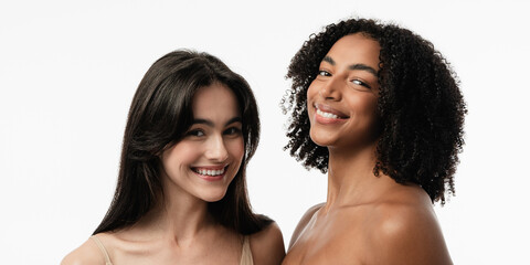 Female models of various ages celebrating their natural bodies in a studio.