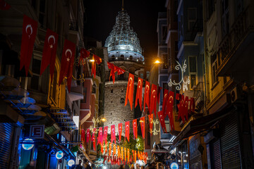 galata tower istanbul with turkey flags - obrazy, fototapety, plakaty