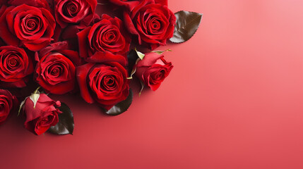 Elegant top view of red roses meticulously arranged on a pale red background, offering a captivating and timeless image with copyspace, showcasing the vibrant beauty of these floral wonders.