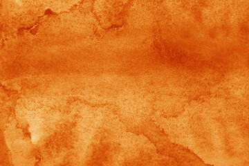 Hand painted orange watercolor background.