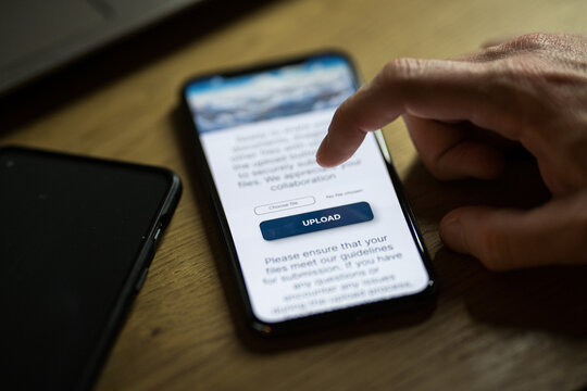 Clicking on upload button on smartphone app