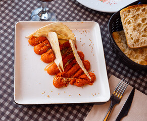 Savory dipping sauce Muhammara made from hot red pepper with walnuts, rusk flour and olive oil...