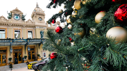 Captivating December scene in Monaco, France. Christmas tree and festive decorations adorning the...