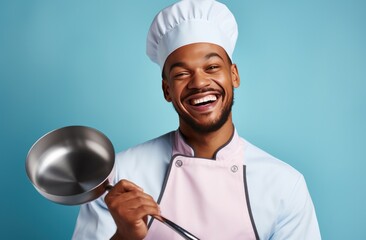 man in chef uniform posing with a ladle chef