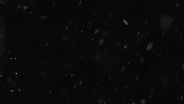 Snowfall overlay, black background - winter, slowly falling snow effect - green screen