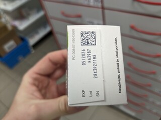 QR code on medicine box. Falsified Medicines Directive. FMD. Unique identifier and an...