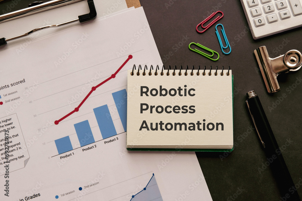 Poster there is notebook with the word robotic process automation. it is as an eye-catching image.