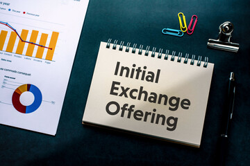 There is notebook with the word Initial Exchange Offering. It is an abbreviation for Initial Exchange Offering as eye-catching image.