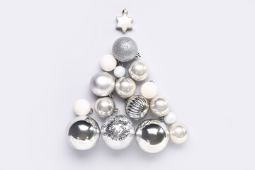Christmas tree made of silver balls on white background