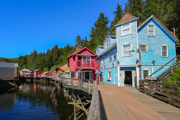 Historic wooden buildings of Creek Street in Ketchikan, built on a raised boardwalk above Ketchikan Creek - Popular tourist area in Alaska, USA