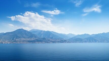 Naklejka premium Landscape of majestic mountains and the serene expanse of the sea.