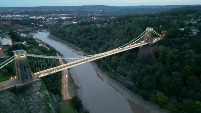 Establishing Aerial View Shot of Bristol UK, United Kingdom, track in, magical light, Clifton Suspension Bridge, River Avon. Aerial view over the Avon Gorge and Clifton Suspension Bridge