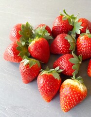 "Delicious Harvest: Five Perfectly Ripened Strawberries
