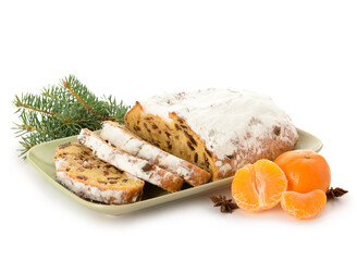 Composition with tasty Christmas stollen on white background
