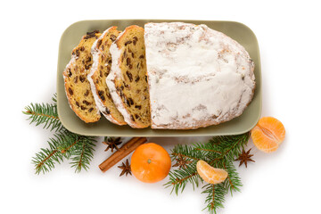 Composition with tasty Christmas stollen on white background