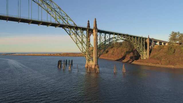 Aerial Drone Video- Yaquina Bay Bridge Sunrise- Newport Oregon- North support detail- dolly in V10