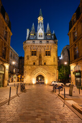 Night view of the Porte Cailhau or Porte du Palais. The former town gate of the city of Bordeaux in France. One of the main touristic attractions of the French city. High quality photography.