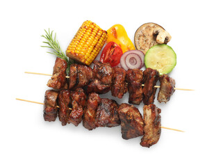 Delicious shish kebabs, rosemary and vegetables isolated on white, top view