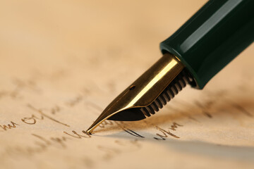 Writing letter with beautiful fountain pen, closeup - obrazy, fototapety, plakaty