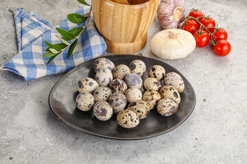 Raw quail eggs in the bowl