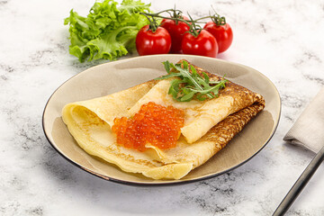 Russian pancake with red caviar