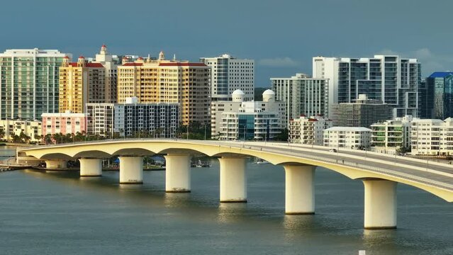 Urban travel destination in the USA. Sarasota city downtown with Ringling Bridge and expensive waterfront high-rise buildings in Florida. Urban travel destination in the USA