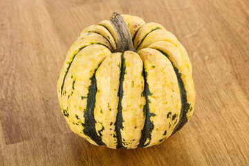 Ripe raw fresh decorative pumpkin