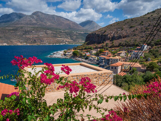 Coastline of the Peloponnese with Bougainvillea and Buildings