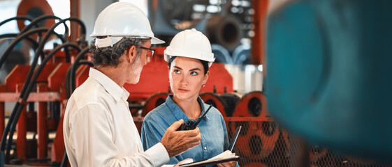 Metalwork manufacturing factory engineer manager conduct inspection of steel industrial machine,...