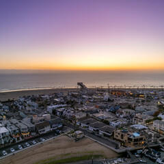 Aerial view of Newport Beach coastline at sunset

