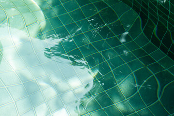 Waves on the surface of the water.