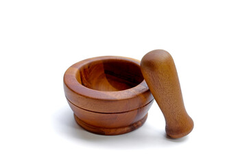 Wooden mortar and pestle on white background