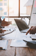 Analyzing results, an accountant, businessman or financial expert analyzes results. Calculates results from graphs, business reports and financial charts. Company stock market.