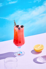Berry-citrus lemonade with thyme, a colorful and aromatic refreshment