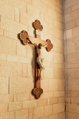 A large crucifix hangs on wall in the main hall of the Church of the Annunciation in the Nazareth...