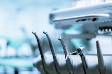 Different dental instruments and tools in a dentists office - obrazy, fototapety, plakaty