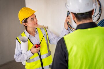 Engineer inspect building structure technicians looking at analyzing unfinished construction project