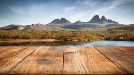 Papier Peint photo Mont Cradle The empty wooden brown table top with blur background of Cradle mountain in Tasmania. Exuberant image. generative AI