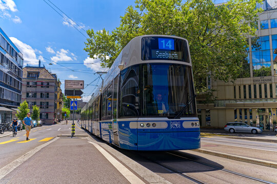 Tram line 14 arriving at tram station named Beckenhof at Swiss City of Z&uuml;rich on a sunny hot summer day. Photo taken July 20th, 2023, Zurich, Switzerland.
