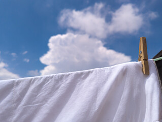 clothes hanging to be taken out after a day of laundry