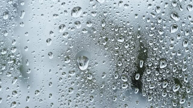 Water drops. Rain on the clear glass window. 