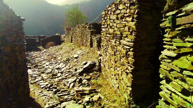 the ruins of an old village at the top of the mountain in Algeria