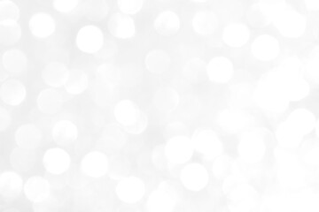 White and gray bokeh background. Photo can be used for the concepts of New Year, Christmas, Wedding Anniversary and all celebrations.