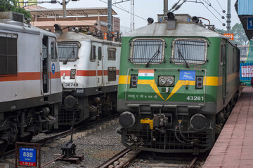 3rd December, 2023, Singapore Road, Orisa, India: An Indian railway train engine crossing a platform.